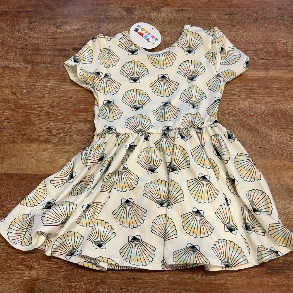NWT Dot Dot Smiles toddlers seashell‎ dress size 6-12 months